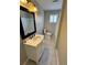 Bathroom with a white vanity, marble countertop, and stylish black faucet at 4809 Thompson Mill Rd, Lithonia, GA 30058