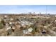 Panoramic aerial view showcasing a residential neighborhood with downtown skyline in the distance at 625 Glenwood Se Pl, Atlanta, GA 30316