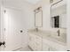 Bright bathroom with double sinks, marble countertops, and modern gold fixtures at 1103 Boulevard Se Dr, Atlanta, GA 30317