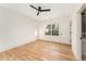 Bedroom features hardwood floors, a ceiling fan, and natural light from the window at 1103 Boulevard Se Dr, Atlanta, GA 30317