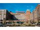 Exterior shot of Ponce City Market with parking and pedestrian access, featuring a clear blue sky at 1103 Boulevard Se Dr, Atlanta, GA 30317