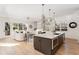 Open concept layout featuring a kitchen island open to the living room at 1103 Boulevard Se Dr, Atlanta, GA 30317