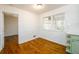 Bright dining area with hardwood floors, white wainscotting and large windows at 1654 Deerfield Cir, Decatur, GA 30033