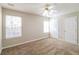 Spacious bedroom with neutral paint, ceiling fan, and ample closet space at 6347 Wellington Walk Way, Lithonia, GA 30058