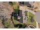 Aerial view showcasing a well-maintained landscaped yard, patio, and community pool near a single-Gathering home at 718 Park Haven Ln, Canton, GA 30115