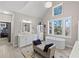 Elegant bathroom featuring a soaking tub, marble counters, and ample natural light at 718 Park Haven Ln, Canton, GA 30115