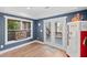 Bonus room featuring a decorative window, access to the deck, and a vintage Coca-Cola vending machine at 718 Park Haven Ln, Canton, GA 30115