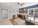 Entertainment area including bar with sink, mini fridge, wall decor, and pub table seating at 718 Park Haven Ln, Canton, GA 30115