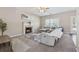Comfortable living room with a fireplace, neutral walls, and cozy seating at 2311 Fall Creek Lndg, Loganville, GA 30052
