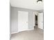 Bedroom featuring double door closet, neutral paint, and carpet at 2740 Barimore Pl, Dacula, GA 30019