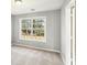 Bright bedroom with natural light and neutral paint at 2740 Barimore Pl, Dacula, GA 30019