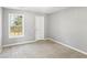 Bedroom featuring carpet flooring and a window at 2740 Barimore Pl, Dacula, GA 30019
