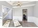 Formal dining room with chair rail and doorway to stairs at 2740 Barimore Pl, Dacula, GA 30019