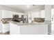 Well-equipped kitchen with stainless steel appliances, white cabinetry, and granite counters at 2740 Barimore Pl, Dacula, GA 30019