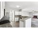 Modern kitchen with stainless steel appliances, granite countertops, and tiled backsplash at 2740 Barimore Pl, Dacula, GA 30019