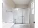 Clean bathroom with shower-tub combo and a vanity at 6939 Hickory Log Rd, Austell, GA 30168