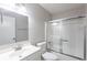 Bathroom with shower and tub, sink, and vanity with neutral paint at 6939 Hickory Log Rd, Austell, GA 30168