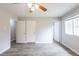 Spacious bedroom featuring two closets, window and wood-look flooring at 6939 Hickory Log Rd, Austell, GA 30168