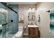 Chic bathroom featuring blue geometric shower, patterned wallpaper, and modern fixtures at 890 Memorial Se Dr # 101, Atlanta, GA 30316