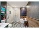 Modern bathroom with glass shower, freestanding tub, and bold patterned floor tiles at 890 Memorial Se Dr # 101, Atlanta, GA 30316