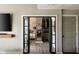 Modern bedroom featuring a glimpse of a walk-in closet through stylish glass paneled doors at 890 Memorial Se Dr # 101, Atlanta, GA 30316