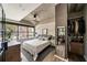 Sunlit bedroom featuring a large window, hardwood floors, and closet at 890 Memorial Se Dr # 101, Atlanta, GA 30316