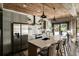 The kitchen features modern appliances, a large island, and access to an outdoor patio at 890 Memorial Se Dr # 101, Atlanta, GA 30316