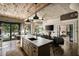 Open-concept living area boasts an updated kitchen and access to balcony and bedroom at 890 Memorial Se Dr # 101, Atlanta, GA 30316