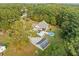 Lovely country home with an in-ground pool, canopy carport, outbuilding, and lush landscaping at 2517 N Hightower Trl, Conyers, GA 30012