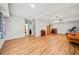 Finished basement with wood-look floors, staircase and furniture at 2517 N Hightower Trl, Conyers, GA 30012