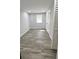 Spacious bedroom with wood-look flooring, natural light, and ample closet space at 624 S Grand Nw Ave, Atlanta, GA 30318