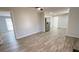 Bright and airy open-concept living room, showcasing the modern flooring and neutral color palette at 624 S Grand Nw Ave, Atlanta, GA 30318