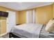 Cozy bedroom with a comfortable bed, modern amenities, and natural light creating a serene atmosphere at 660 Simmons St, Atlanta, GA 30318