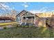 Charming one-story home with a well-manicured lawn and modern wood fence at 660 Simmons St, Atlanta, GA 30318
