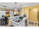 An open-concept living space is shown, connecting the kitchen, dining area, and living room, featuring modern decor at 660 Simmons St, Atlanta, GA 30318