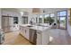 Open-concept kitchen with an island connecting to the living area, filled with natural light at 816 Berne St # 3, Atlanta, GA 30316