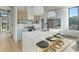 Modern kitchen with island, bar stool seating, and stainless steel appliances at 816 Berne St # 3, Atlanta, GA 30316
