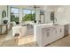 Bright and airy living room connected to a modern kitchen, with large windows and stylish decor at 816 Berne St # 3, Atlanta, GA 30316