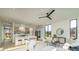 Bright, open-concept living room featuring a modern kitchen, stylish furniture, and large windows for natural light at 816 Berne St # 3, Atlanta, GA 30316