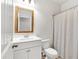 Bright bathroom with vanity, mirror, and shower/tub combo perfect for guests at 90 Citrine Way, Acworth, GA 30101