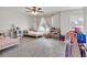 Bright bedroom with two twin beds, neutral walls, and light-filtering curtains at 90 Citrine Way, Acworth, GA 30101