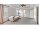 Open and airy main bedroom with natural lighting and lounge chaise at 90 Citrine Way, Acworth, GA 30101