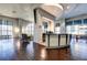 Well-appointed game room features a modern bar, stylish seating area, and large windows that provide natural light at 3040 Peachtree Nw Rd # 1509, Atlanta, GA 30305