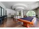 Inviting game room boasts a pool table, bar area, and stylish seating under a unique modern ceiling design at 3040 Peachtree Nw Rd # 1509, Atlanta, GA 30305