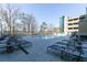 Relaxing pool deck with comfortable lounge chairs, ideal for sunbathing with a view of the surrounding greenery at 3040 Peachtree Nw Rd # 1509, Atlanta, GA 30305