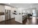 Well-lit kitchen with a large island, stainless steel appliances, and open layout at 4327 Water Elm Aly, Doraville, GA 30360