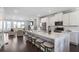 Modern kitchen with quartz island, stainless appliances, and open floor plan at 4327 Water Elm Aly, Doraville, GA 30360