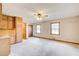 Large bedroom with an en-suite kitchenette, ample storage, and natural light at 5010 Highway 20 Ne, Conyers, GA 30012
