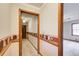 Inviting hallway with decorative trim, wood accents, and views into adjacent rooms at 5010 Highway 20 Ne, Conyers, GA 30012