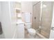 Bathroom featuring a glass-enclosed shower, white cabinets, and tile flooring at 5053 Chapel Xing, Douglasville, GA 30135